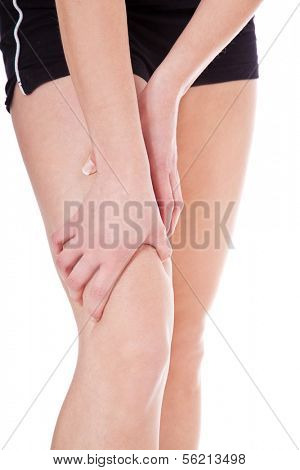 Female person suffers from muscle cramp. All on white background.