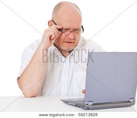 Charismatic middle aged man got a problem with his laptop. All on white background.