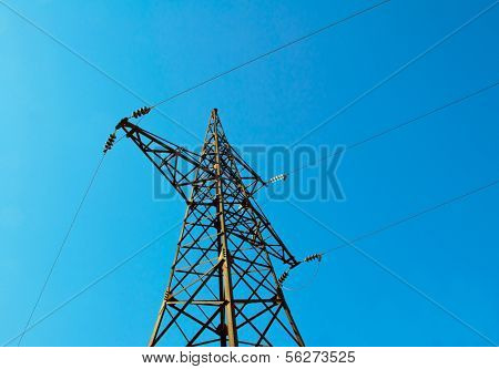 Pylon & Power Lines Against Blue Sky