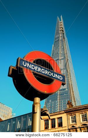 LONDON, UK - SEP 27: The Shard and underground sign on September 27, 2013 in London, UK. the Shard is currently the tallest building in the European Union