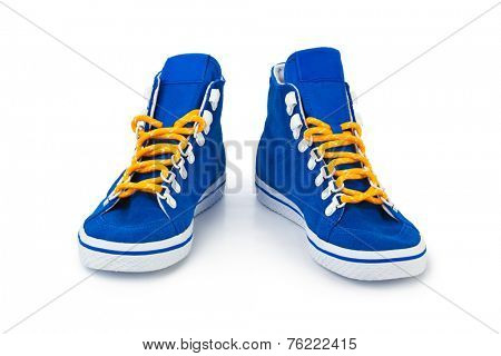 Blue sneakers isolated on white background