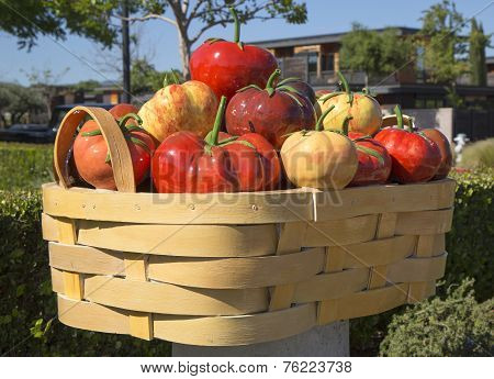 Abundance or tomato basket by Peter Hazel at art walk in Yountville, California