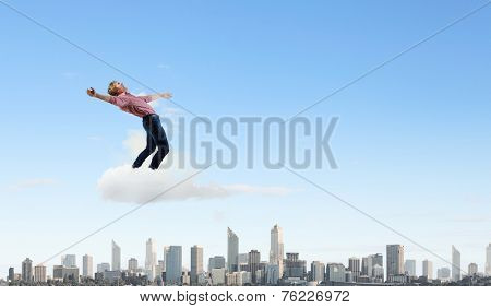 Young guy in casual evading from light rays