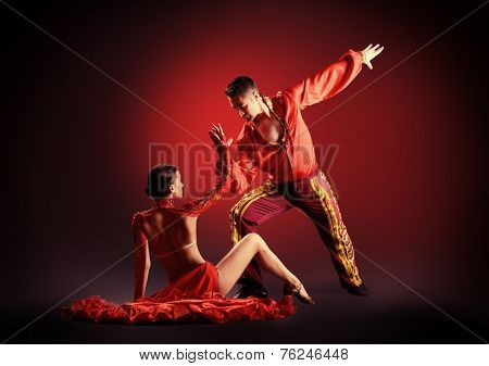Professional dancers perform latino dance. Passion and expression.