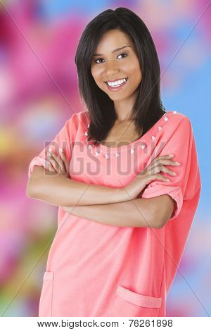 Happy tanned woman looking at the camera