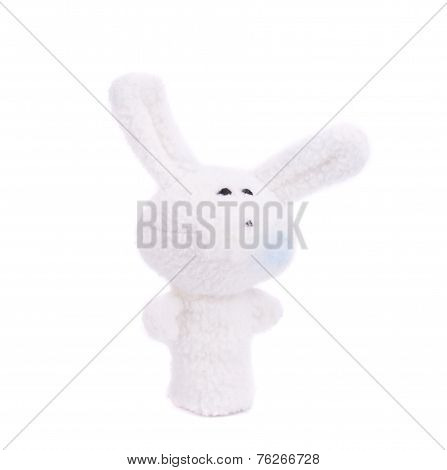 Finger wearing puppet rabbit.