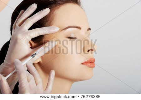 Portrait of woman having cosmetic botox injection.