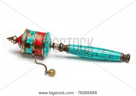 Tibetan buddhist Mani wheel or hand prayer wheel isolated on white