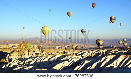 Hot air balloon flying over Cappadocia.