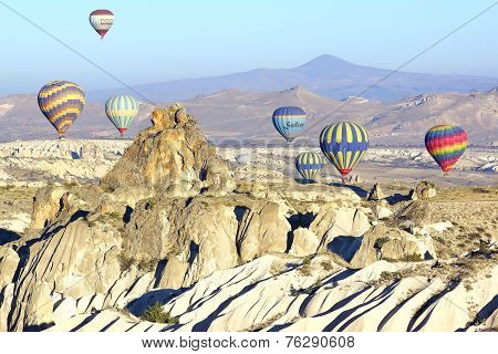 Hot air balloon flying over Cappadocia.