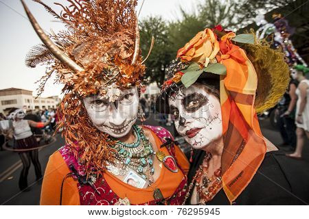 Women In Dramatic Dia De Los Muertos Makeup