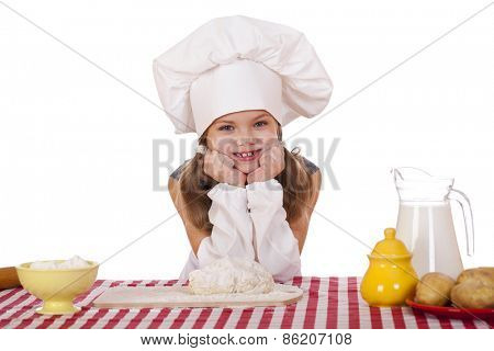 Beautiful little baby dressed as a cook, isolated on a white background