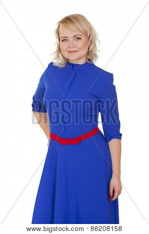 Mid adult cheerful woman portrait in blue dress, attractive caucasian middle 40 years old woman over white