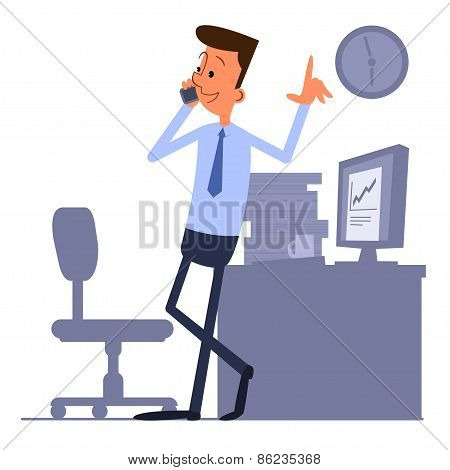 Man Standing Near To Workplace And Talking On The Phone