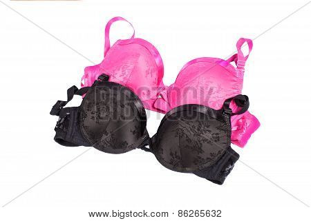 Pink and black bras isolated on white background