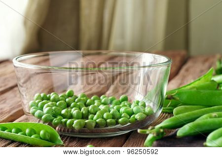 Peeled Young Peas In A Glass Bowl