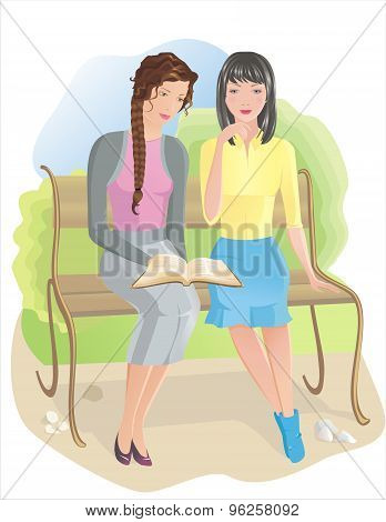 Two girls with Bible outdoor
