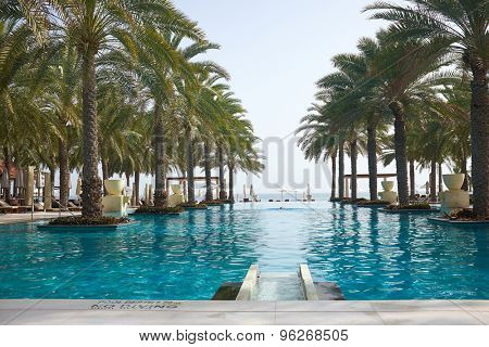 MUSCAT, OMAN - 2015.04.10: Swimming pool of the Al Bustan hotel in Muscat. 2015.04.10  in Muttrah, Sultanate of Oman, Middle East