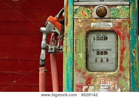 A rusty old gas pump