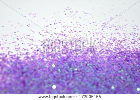 glitter purple on a right angle white background.