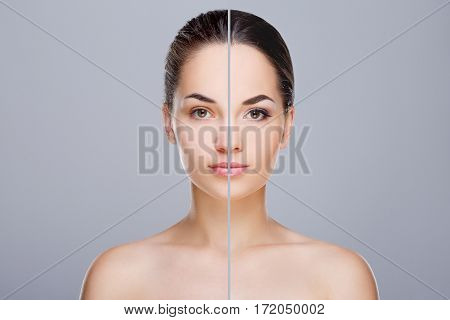 Comparison portrait of woman. Divided face of woman. One half of face with retouch and without make-up, before. Another half of face with make-up, after. Studio, head and shoulders, indoors. Gray background