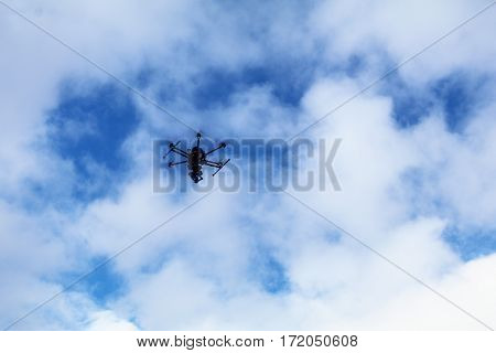 Drone in the Air. Blue Sky Flying