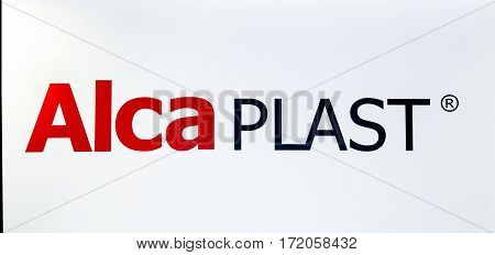 Moscow, Russia - February, 2016: Alcaplast company logo. Stocker letters on the white wall. Czech company produces valves, traps, modules, grids, drains, toilet seats and other products.
