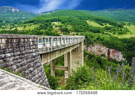 Bridge mountain landscape, Montenegro. Durdevica Tara arc bridge in the mountains. One of the highest automobile bridges in Europe.