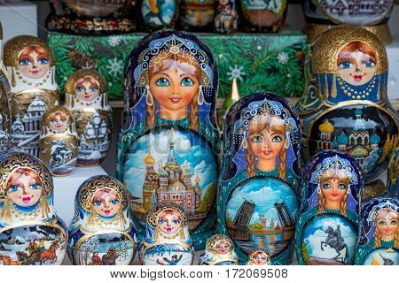 Collection of russian traditional souvenirs on marketplace. Russian nesting doll named babushka doll or matryoshka