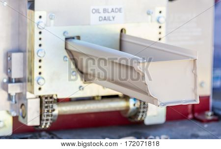 Aluminum Rain Gutter Feeding Through Seamless Shaping Machine.