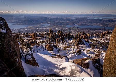 Snow in winter on top of Mt. Wellington with view on Hobart, Tasmania, Australia
