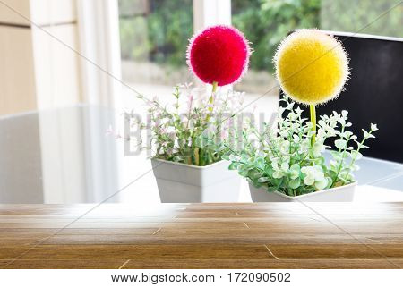 Close up plastic flowers on the table
