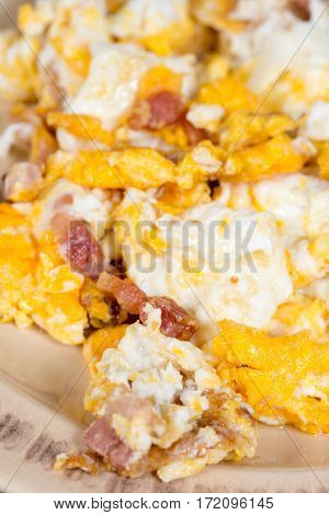 Close up macro fried eggs with bacon.