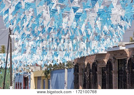 Festive overhead street decoration in Cholula Mexico