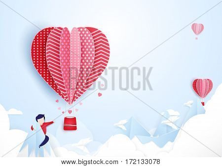 Young man finding love concept. Hot air balloons flying over on mountains and cloud. paper art style design
