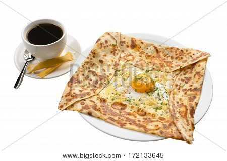 Ajarian traditional baked meal khachapuri with cheese, egg and yellow yolk and cup of  strong coffee on white isolated background