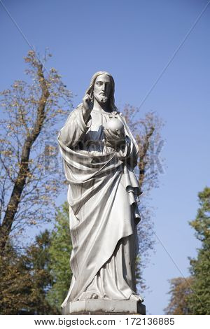 Jesus Christ the teacher (statue on dlue background)