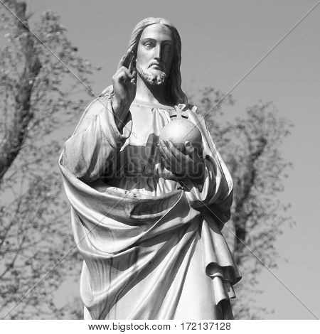 Jesus Christ the teacher (statue on dlue background)