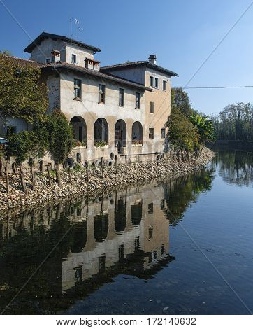 Country house along the Naviglio Grande of Turbigo (Milan Lombardy Italy) at fall