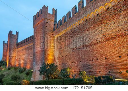 The amazing fortress in the Gradara village in Italy during sunset during sunset