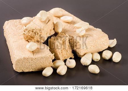 peanut halva on a dark background closeup.