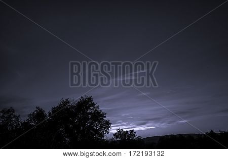 Sunset over the fields of Galicia in black and white
