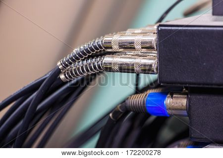 Audio cables and connectors in studio equipment. Selective focus