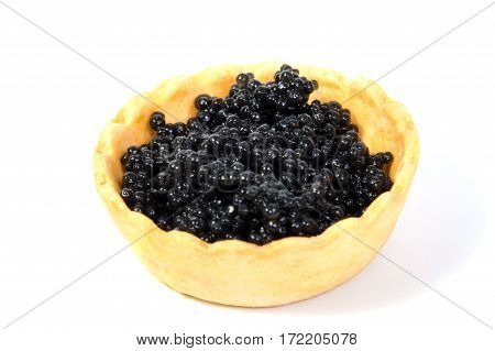 Caviar in tartlet isolated on white background
