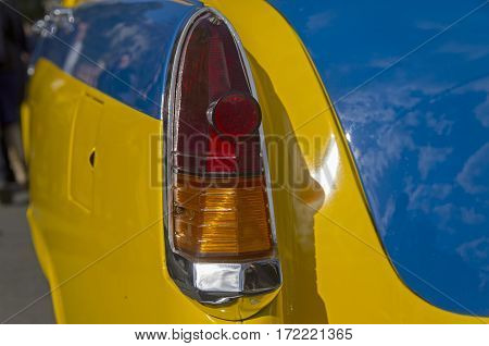 MOSCOW RUSSIA - OCTOBER 1 2016: Stoplight of the old egendary Soviet car Volga GAZ M-21. The car is painded as a police car.