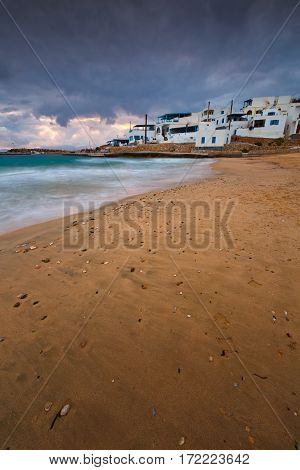 View of the village on Donoussa island from the beach. Naxos island can be seen in the background.