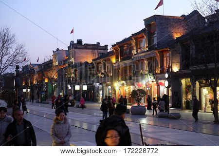BEIJING - FEBRUARY 22: Qianmen street, a famous old shopping street over hundreds years in Beijing, China, February 22, 2016.