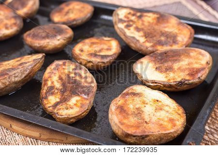 Baked Potatoes In The Oven On The Frying Pan