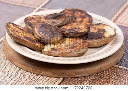 Baked Potatoes With Shell Served On The Plate