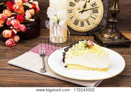 Cake piece Pigeon milk on plate. Stdio Photo
